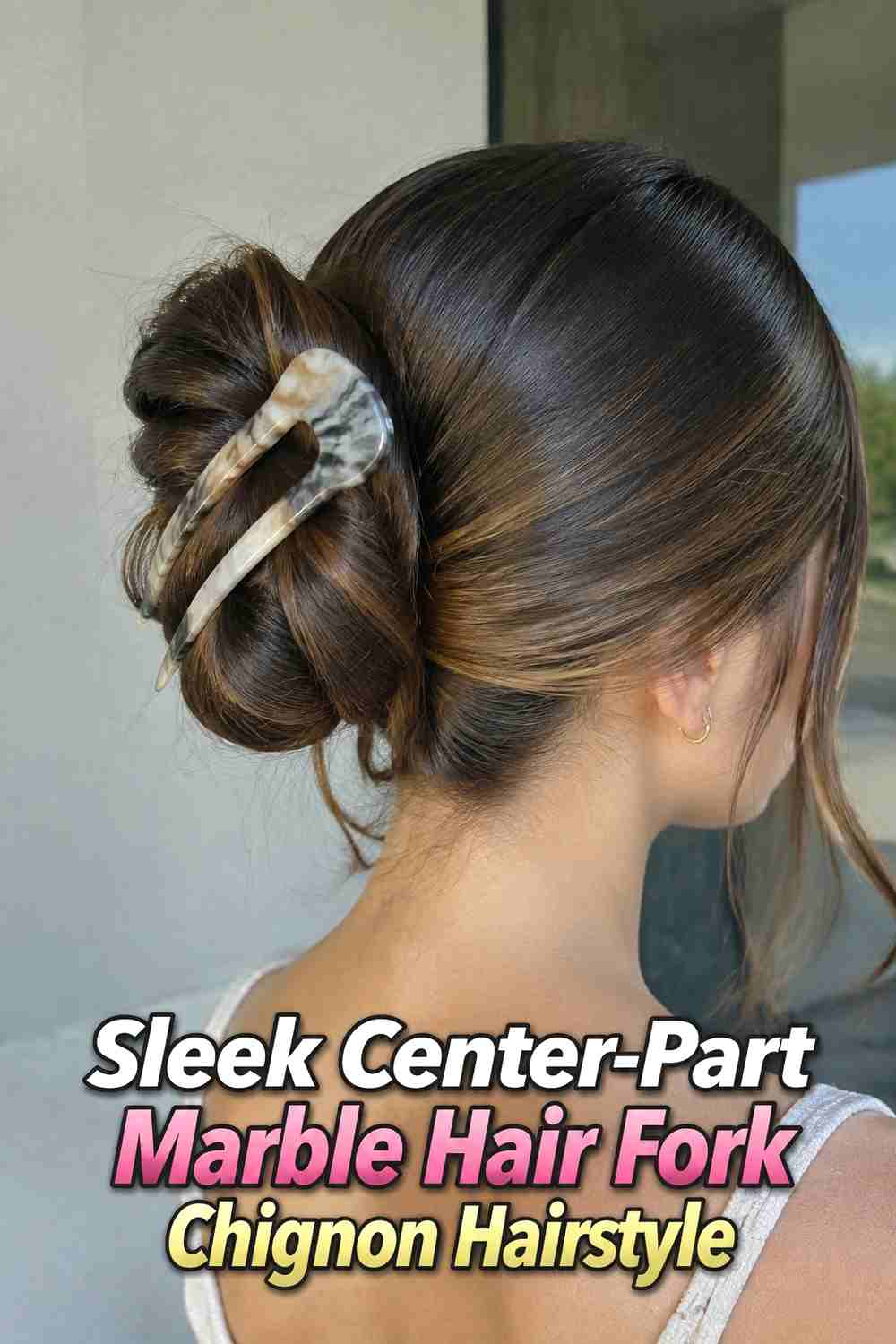 1. Sleek Center Part Marble Hair Fork Chignon Hairstyle