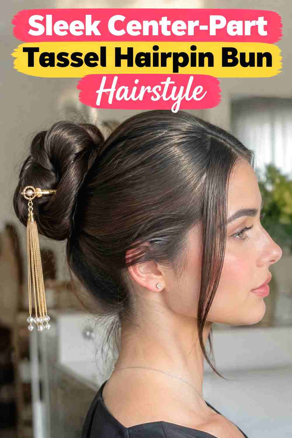 8. Sleek Center Part Tassel Hairpin Bun Hairstyle