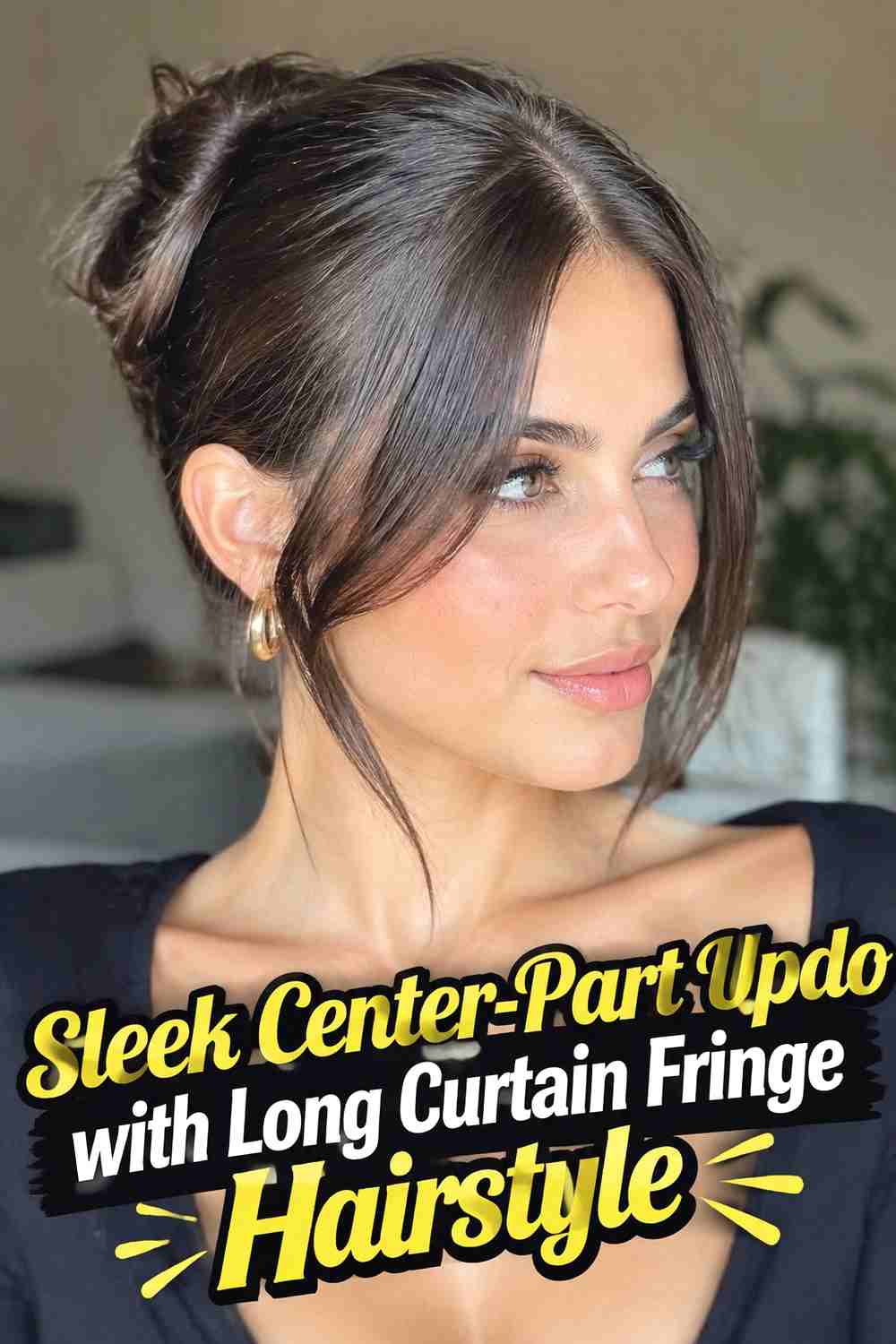 16. Sleek Center Part Updo With Long Curtain Fringe Hairstyle
