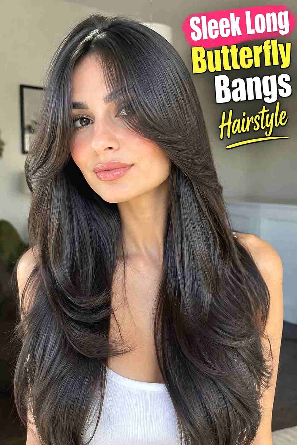 13. Sleek Long Butterfly Bangs Hairstyle