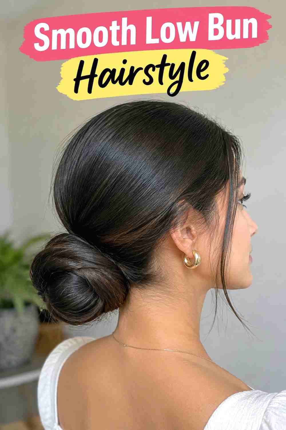 4. Smooth Low Bun Hairstyle