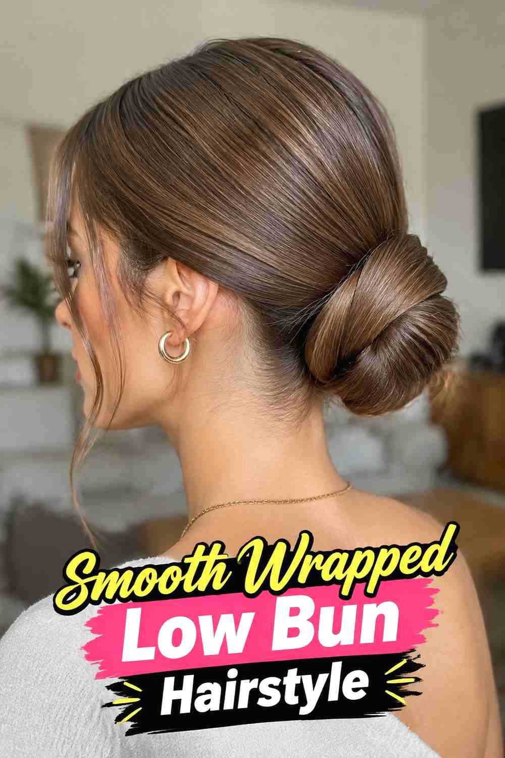 5. Smooth Wrapped Low Bun Hairstyle