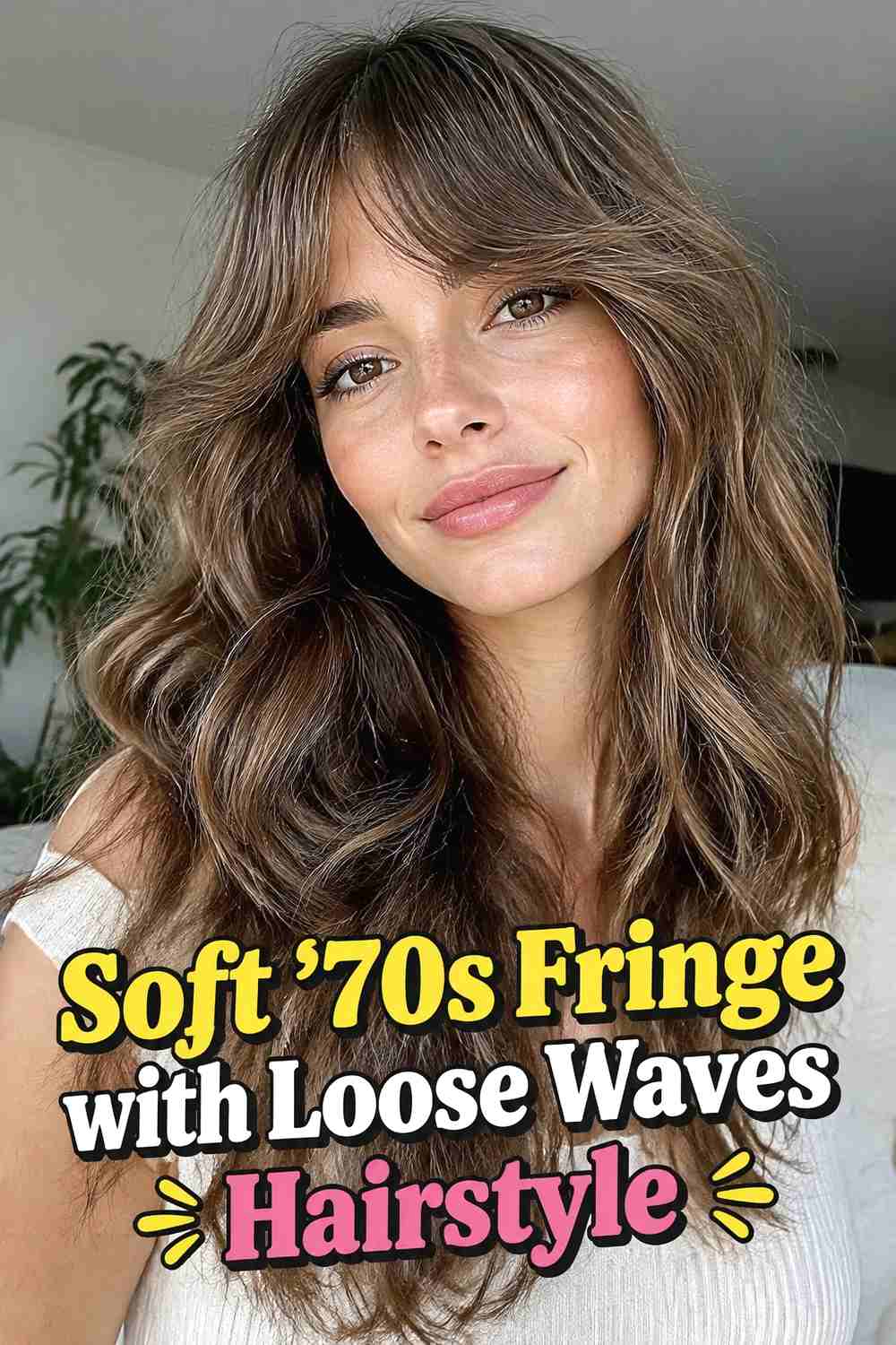 7. Soft 70s Fringe With Loose Waves Hairstyle