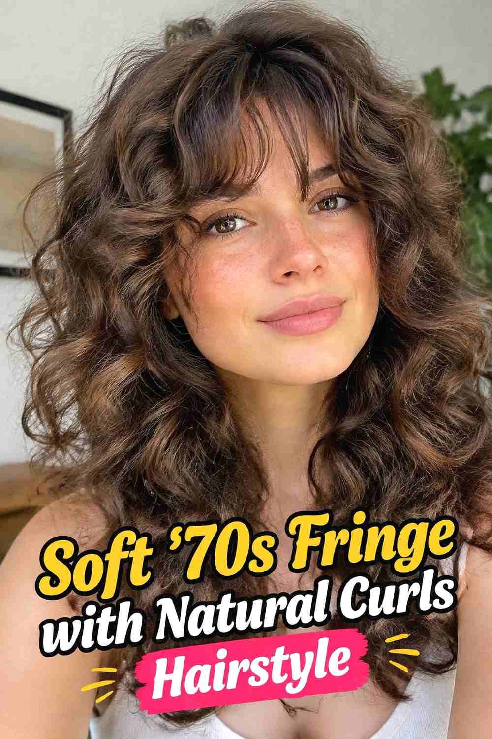 11. Soft 70s Fringe With Natural Curls Hairstyle