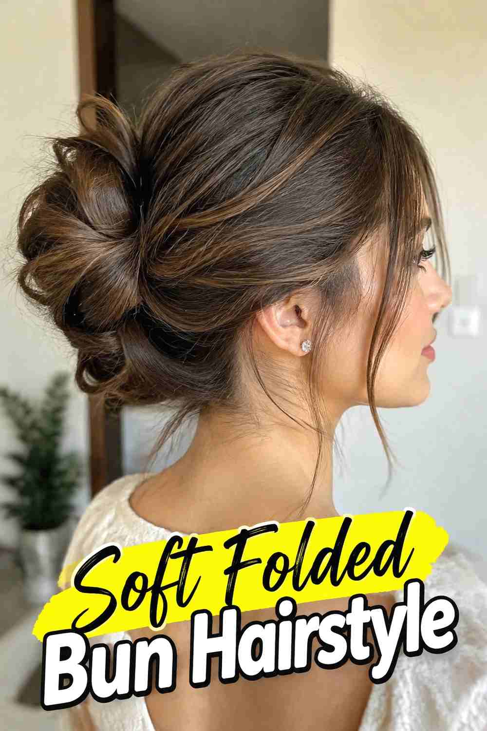 16. Soft Folded Bun Hairstyle
