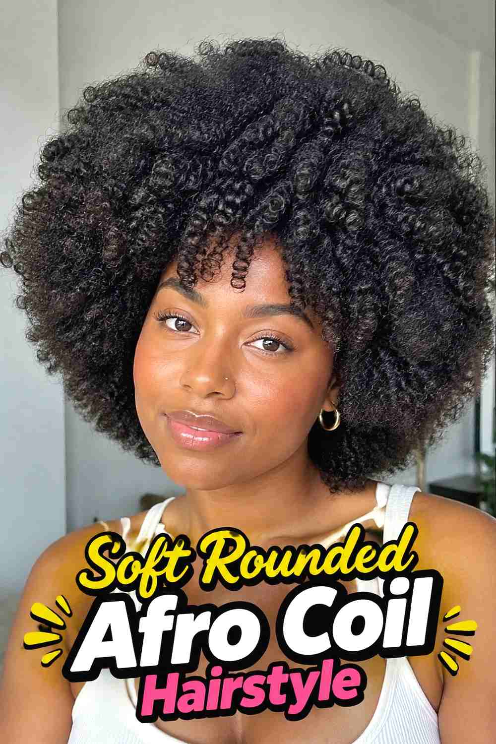 1. Soft Rounded Afro Coil Hairstyle