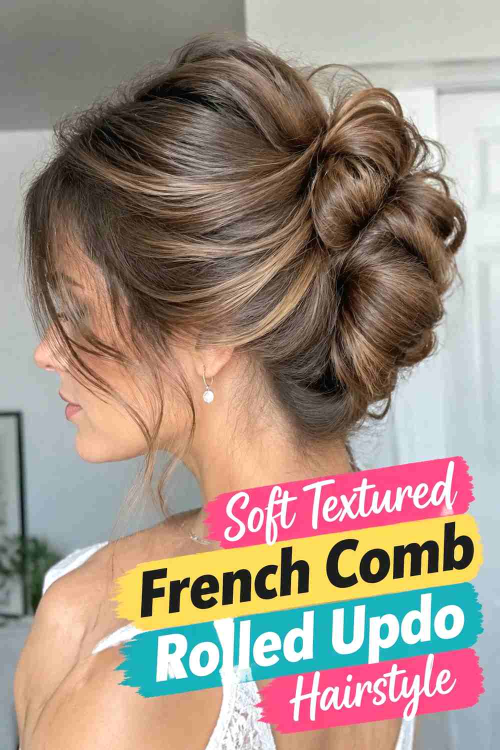 6. Soft Textured French Comb Rolled Updo Hairstyle