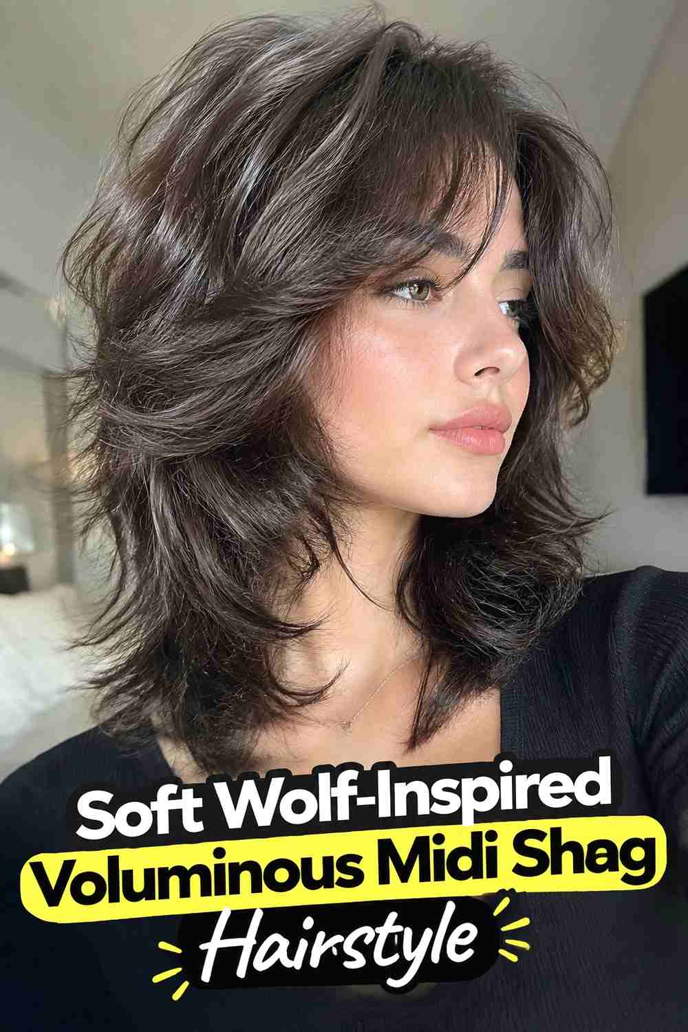 7. Soft Wolf Inspired Voluminous Midi Shag Hairstyle