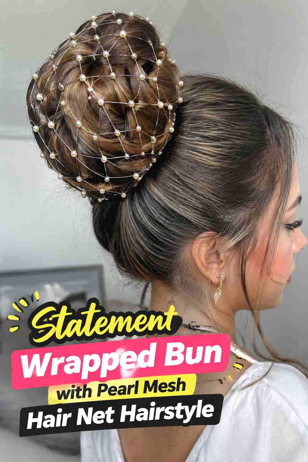 18. Statement Wrapped Bun With Pearl Mesh Hair Net Hairstyle