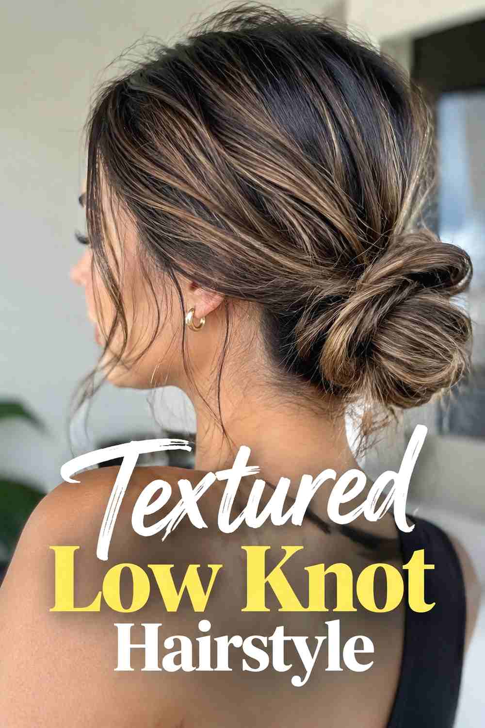 14. Textured Low Knot Hairstyle