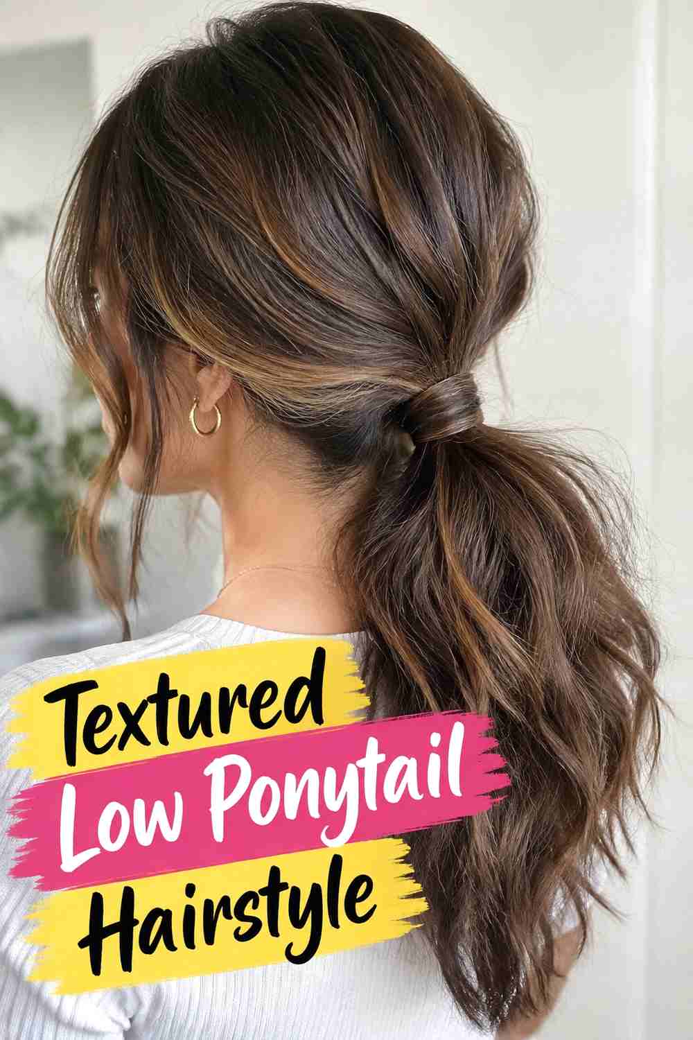 5. Textured Low Ponytail Hairstyle
