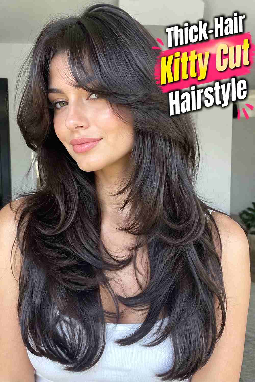 14. Thick Hair Kitty Cut Hairstyle