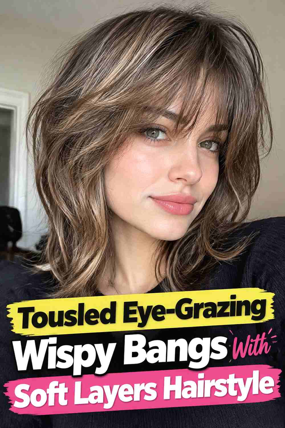 12. Tousled Eye Grazing Wispy Bangs With Soft Layers Hairstyle