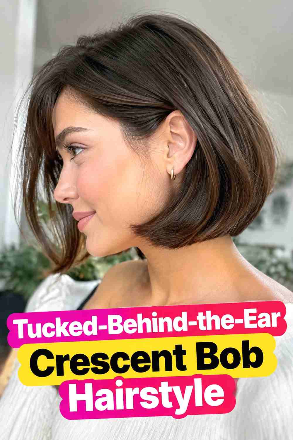 14. Tucked Behind The Ear Crescent Bob Hairstyle