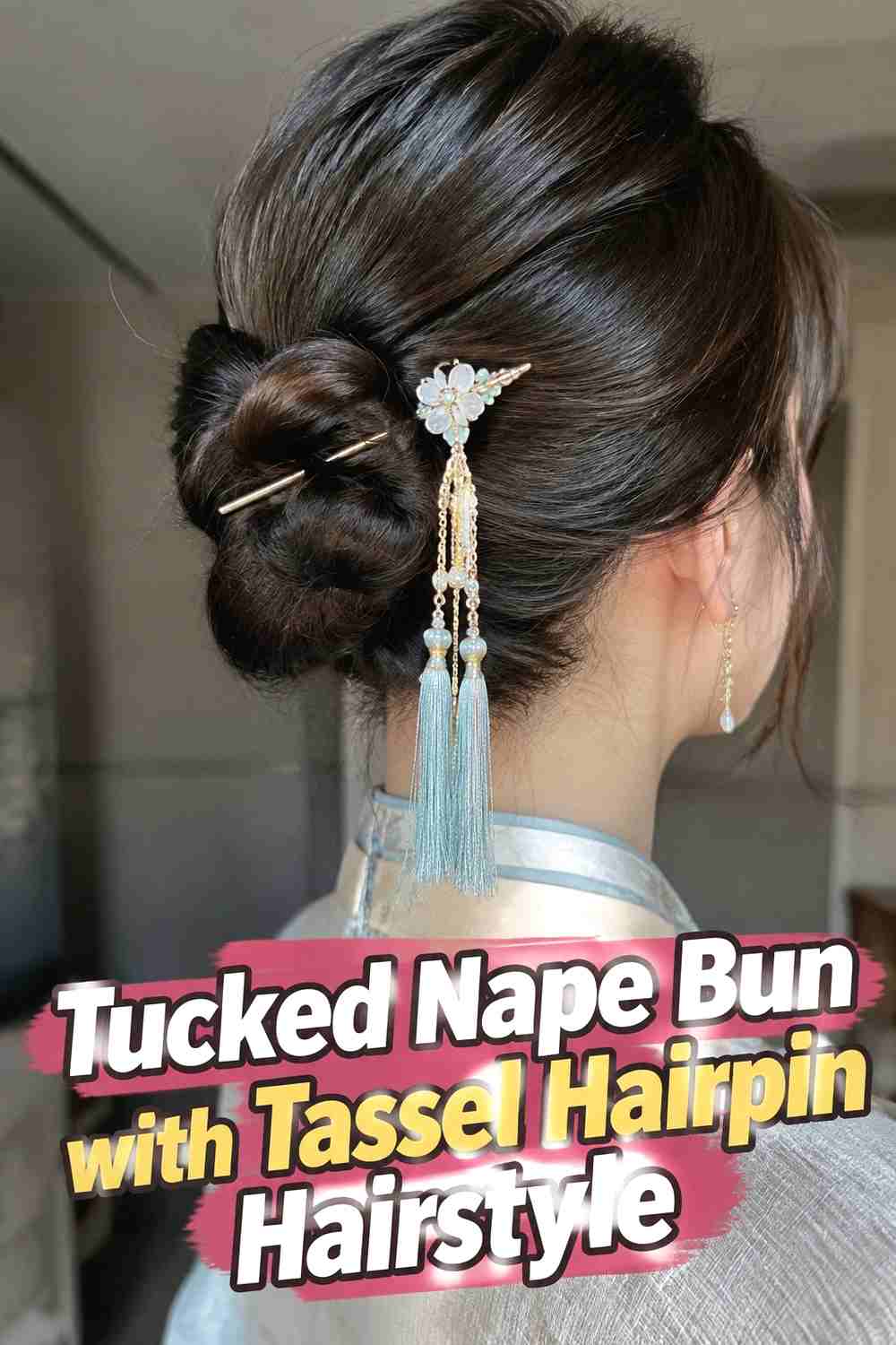 17. Tucked Nape Bun With Tassel Hairpin Hairstyle