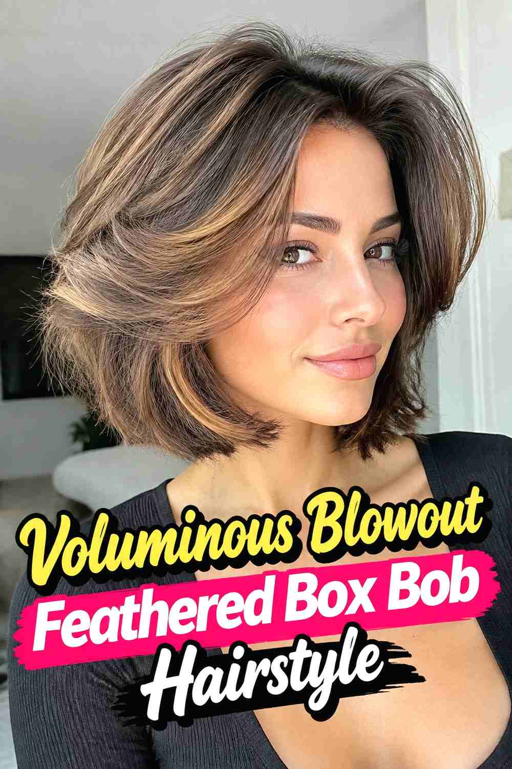 9. Voluminous Blowout Feathered Box Bob Hairstyle