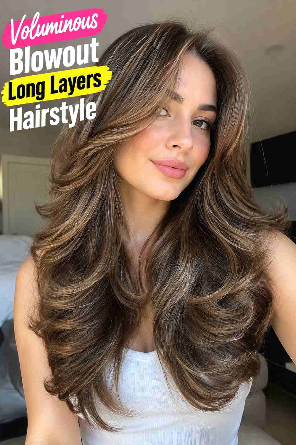8. Voluminous Blowout Long Layers Hairstyle