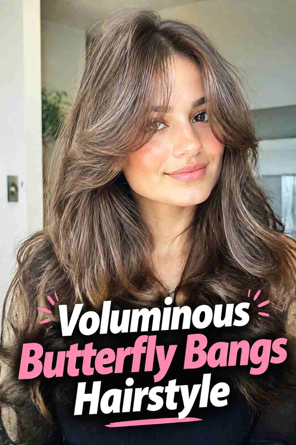13. Voluminous Butterfly Bangs Hairstyle