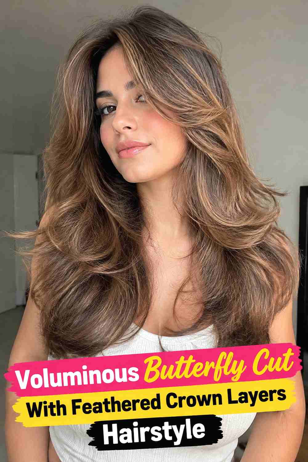 5. Voluminous Butterfly Cut With Feathered Crown Layers Hairstyle