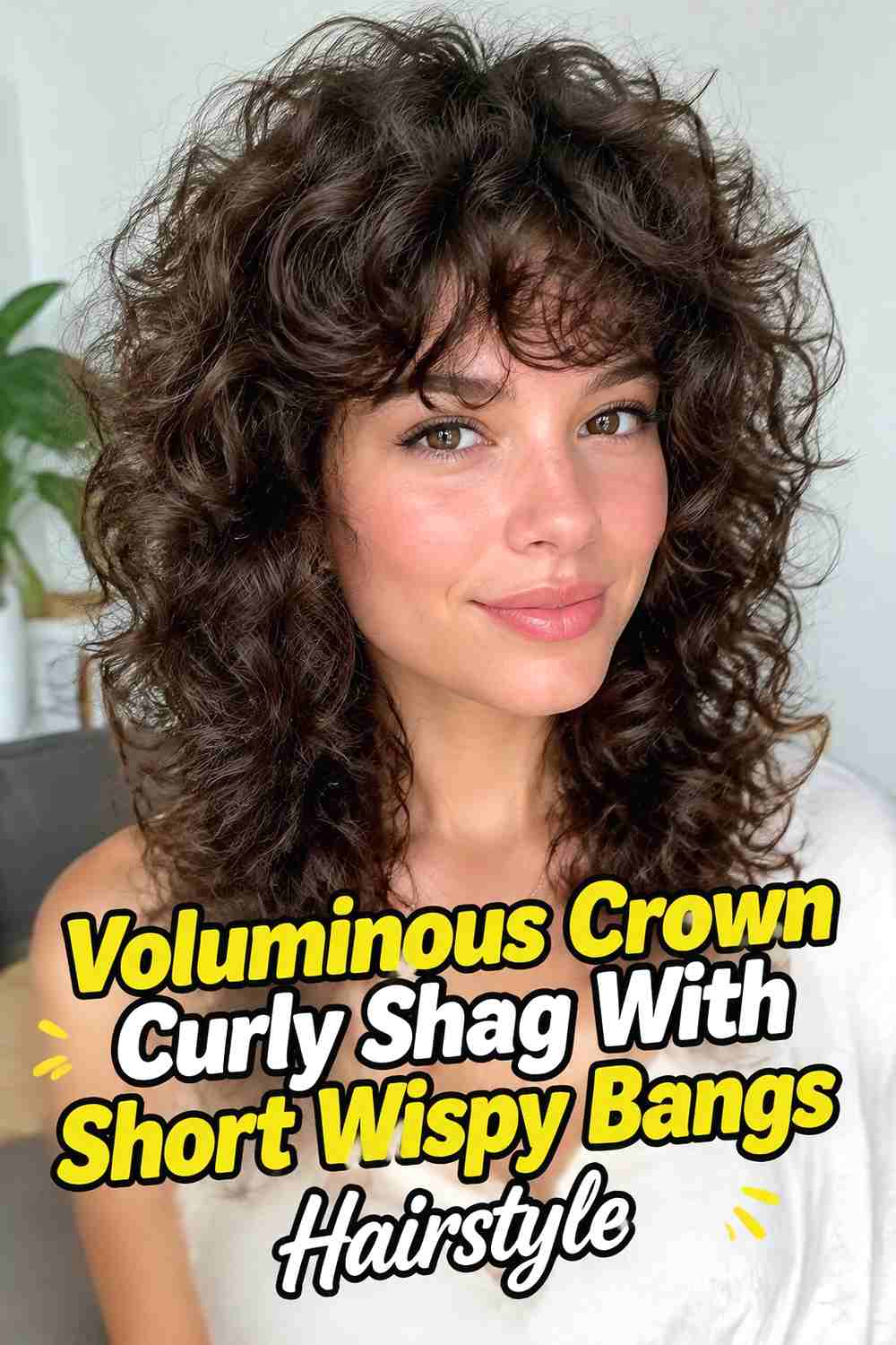 10. Voluminous Crown Curly Shag With Short Wispy Bangs Hairstyle