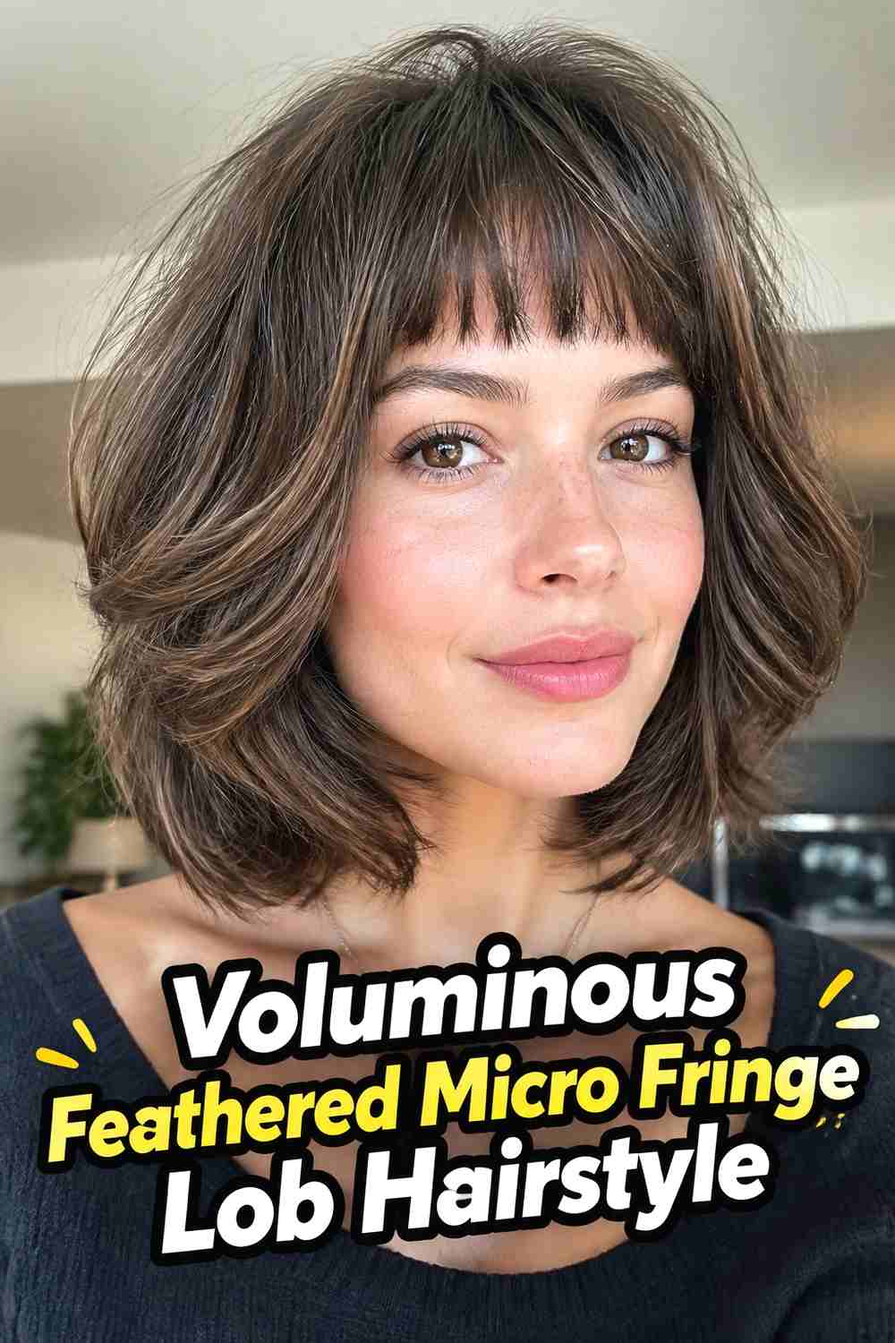 12. Voluminous Feathered Micro Fringe Lob Hairstyle