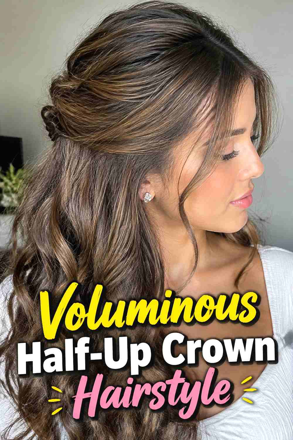 17. Voluminous Half Up Crown Hairstyle