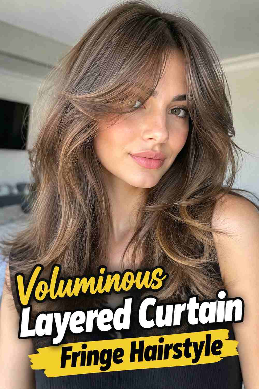 20. Voluminous Layered Curtain Fringe Hairstyle