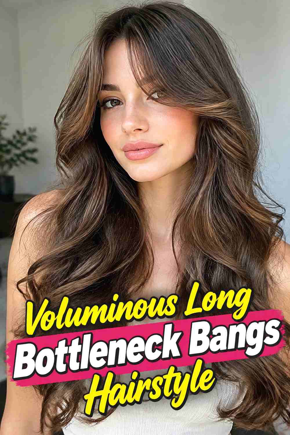13. Voluminous Long Bottleneck Bangs Hairstyle