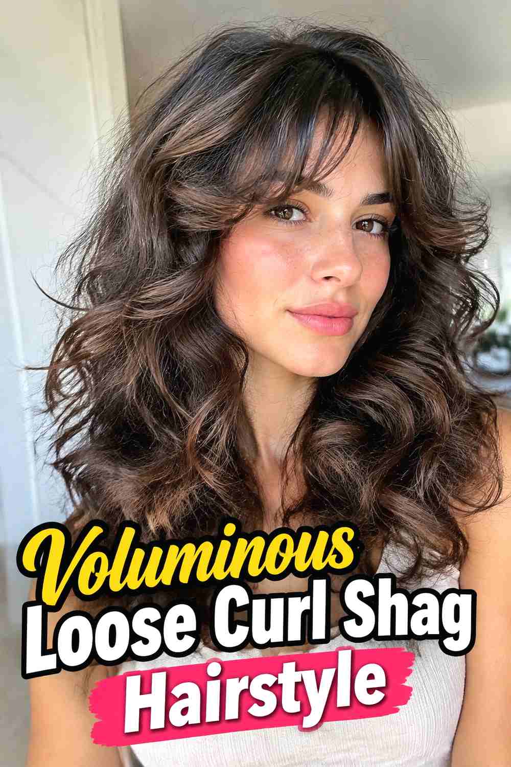 15. Voluminous Loose Curl Shag Hairstyle