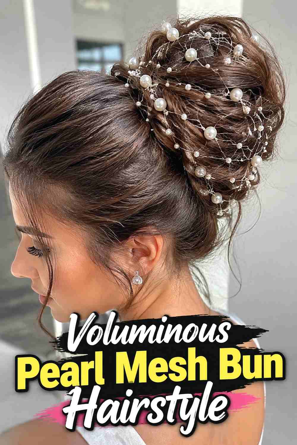 18. Voluminous Pearl Mesh Bun Hairstyle