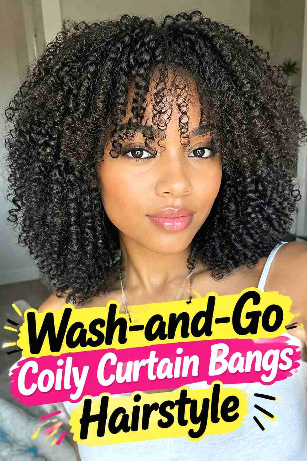 15. Wash And Go Coily Curtain Bangs Hairstyle