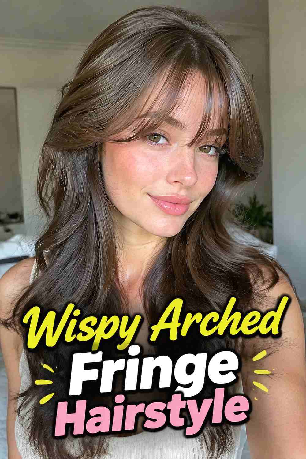 4. Wispy Arched Fringe Hairstyle