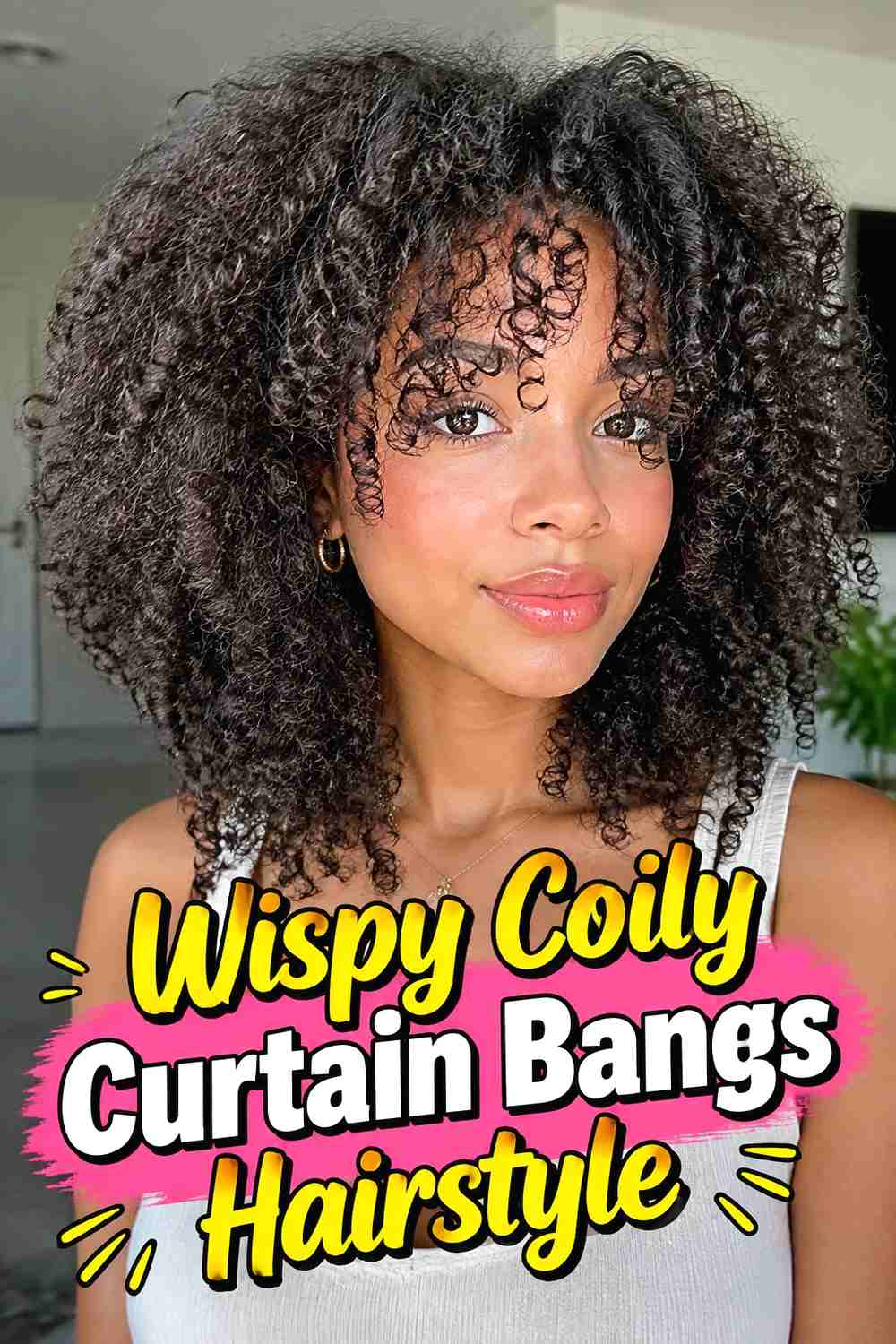 3. Wispy Coily Curtain Bangs Hairstyle