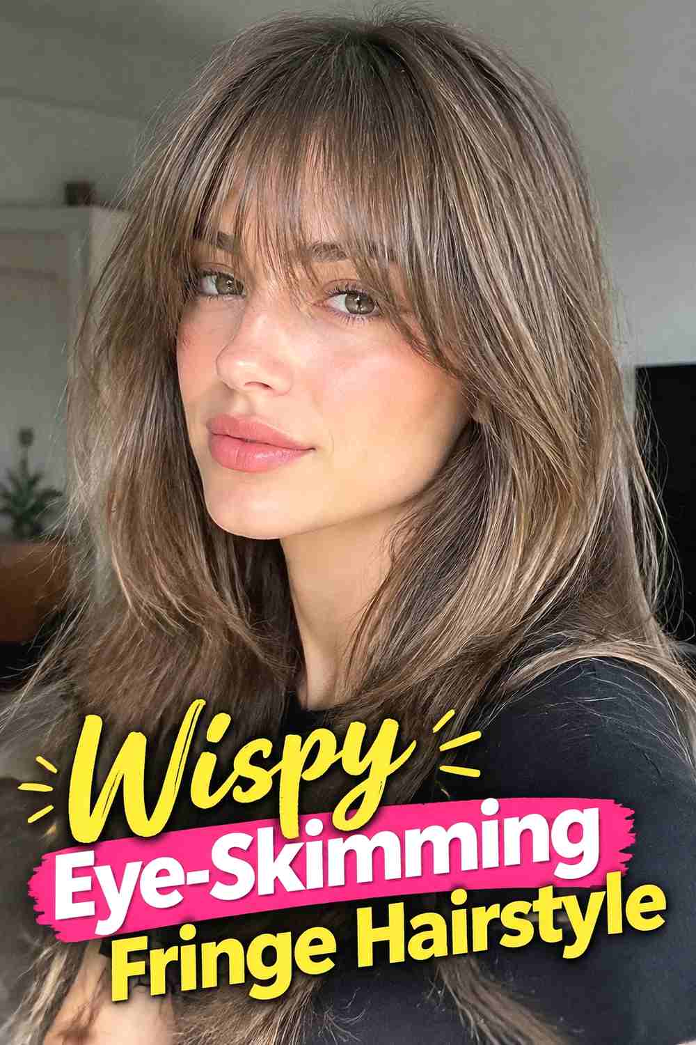 2. Wispy Eye Skimming Fringe Hairstyle